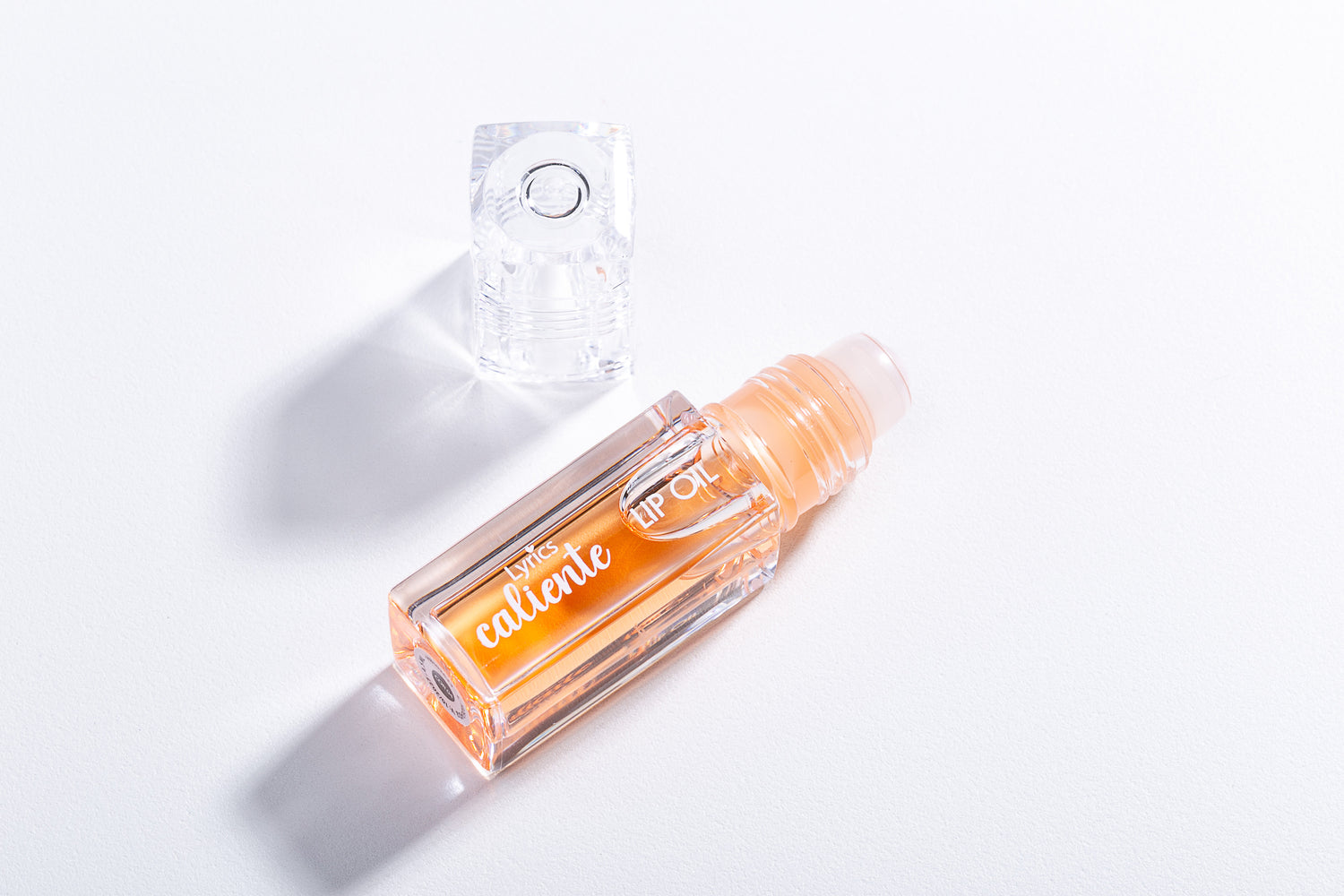 Lip Glow Oil Coleção Caliente - Lyrics