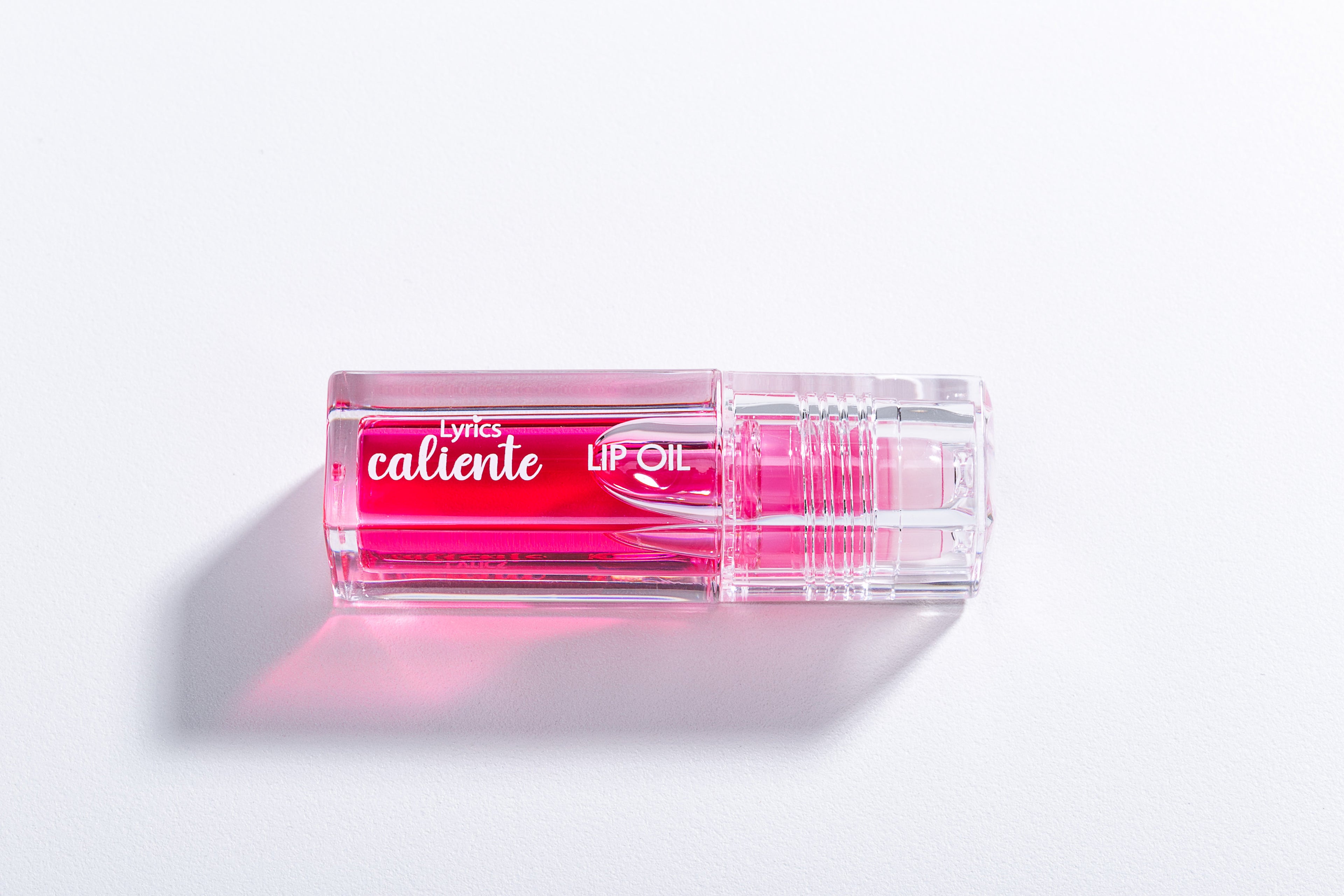 Lip Glow Oil Coleção Caliente - Lyrics